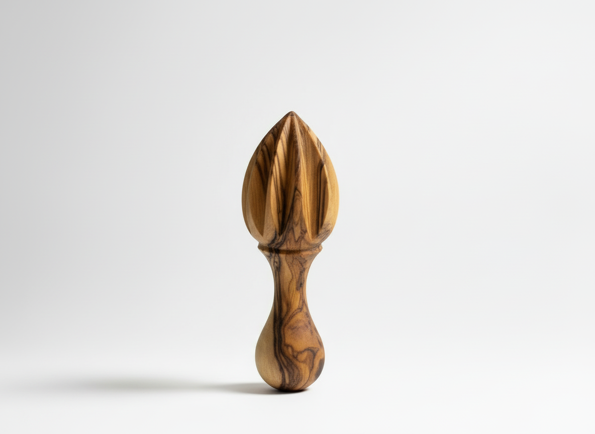Olive wood lemon citrus reamer on a white background