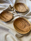 Stacked-set-olive-wood-plates-circle-bethlehem-beit-jala