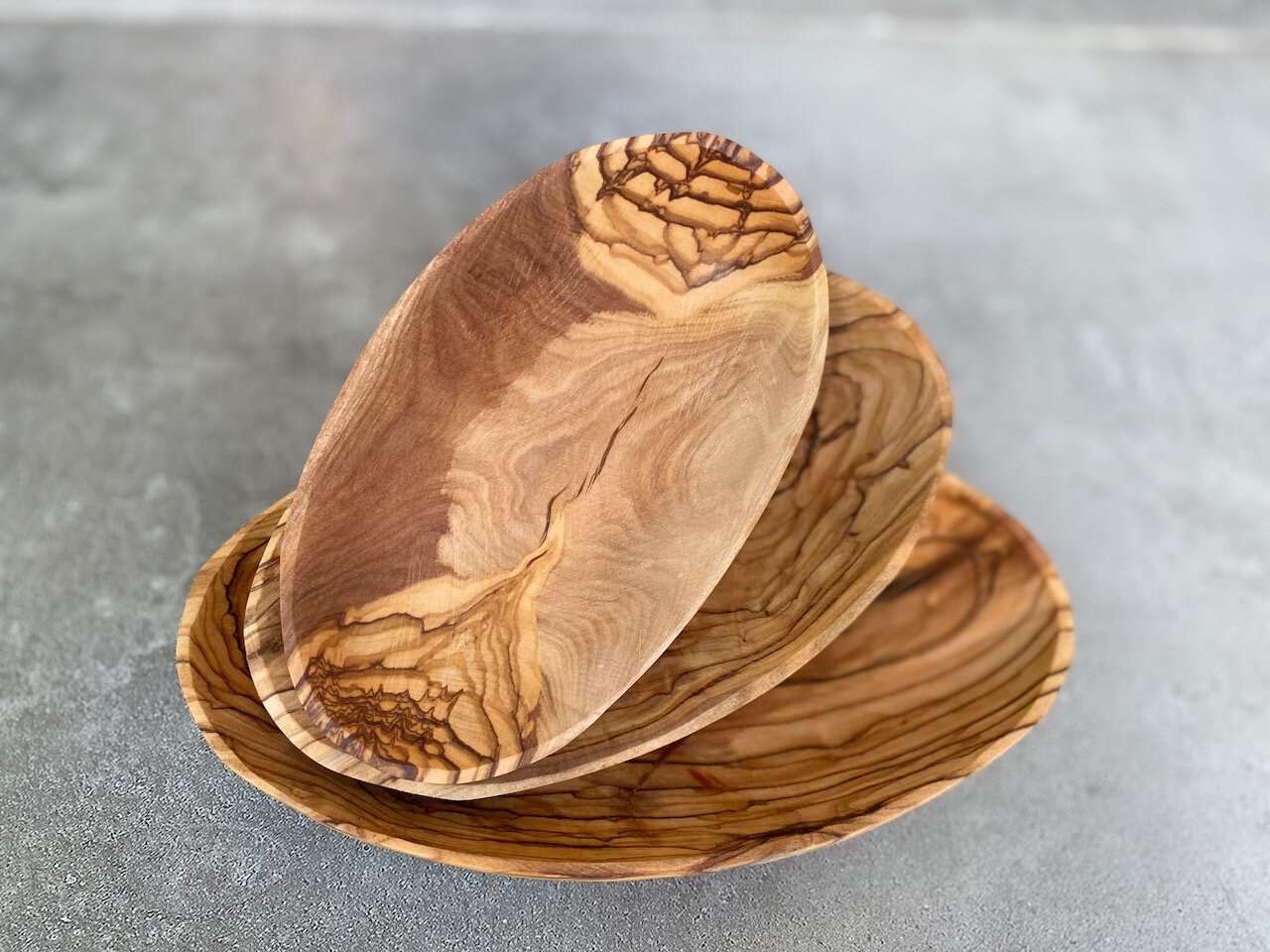 stacked-olive-wood-set-oval-plates-bethlehem-palestine